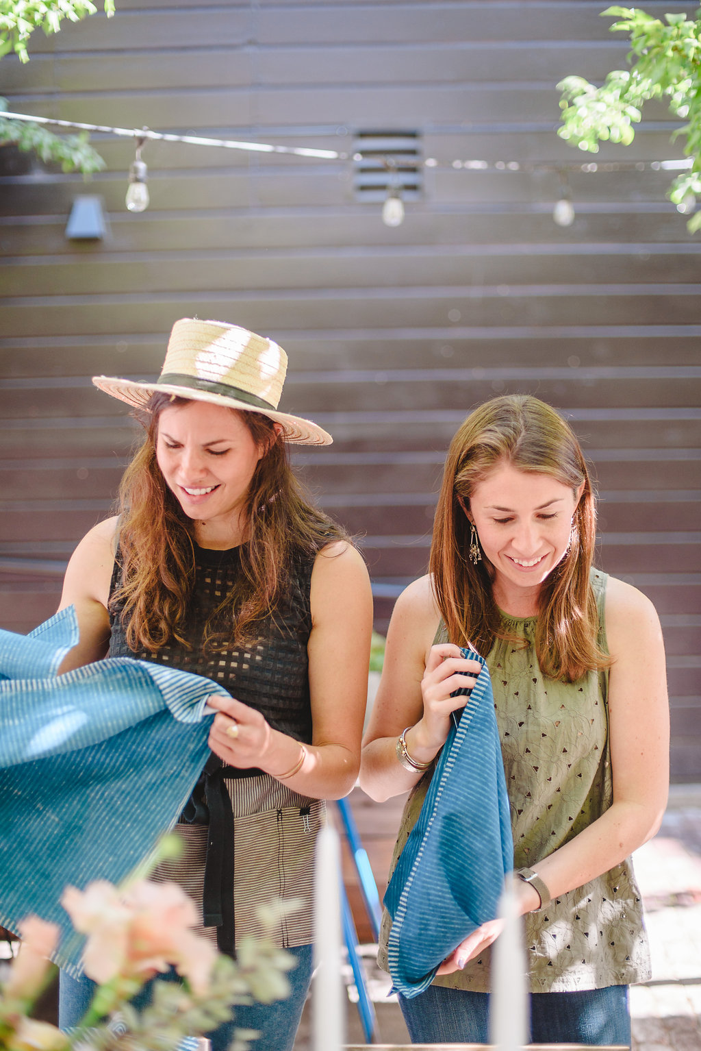 Amanda and I intensely focused on figuring out the perfect napkin fold. OCD tendencies at their best!! These tiny details are the ones that make the overall picture perfect!